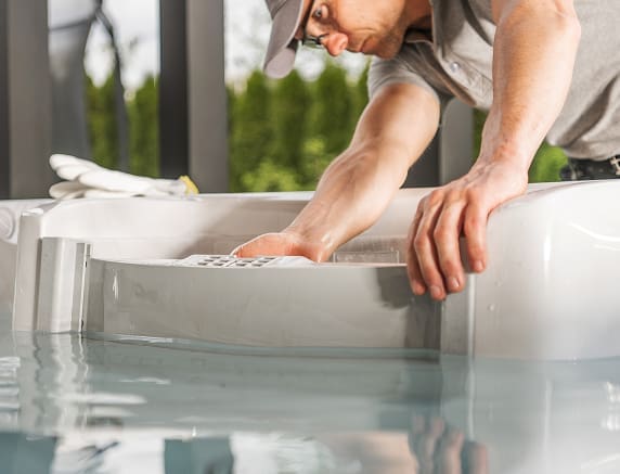 spa-technician-performing-modern-hot-tub-repair-2026-01-09-01-07-31-utc 1